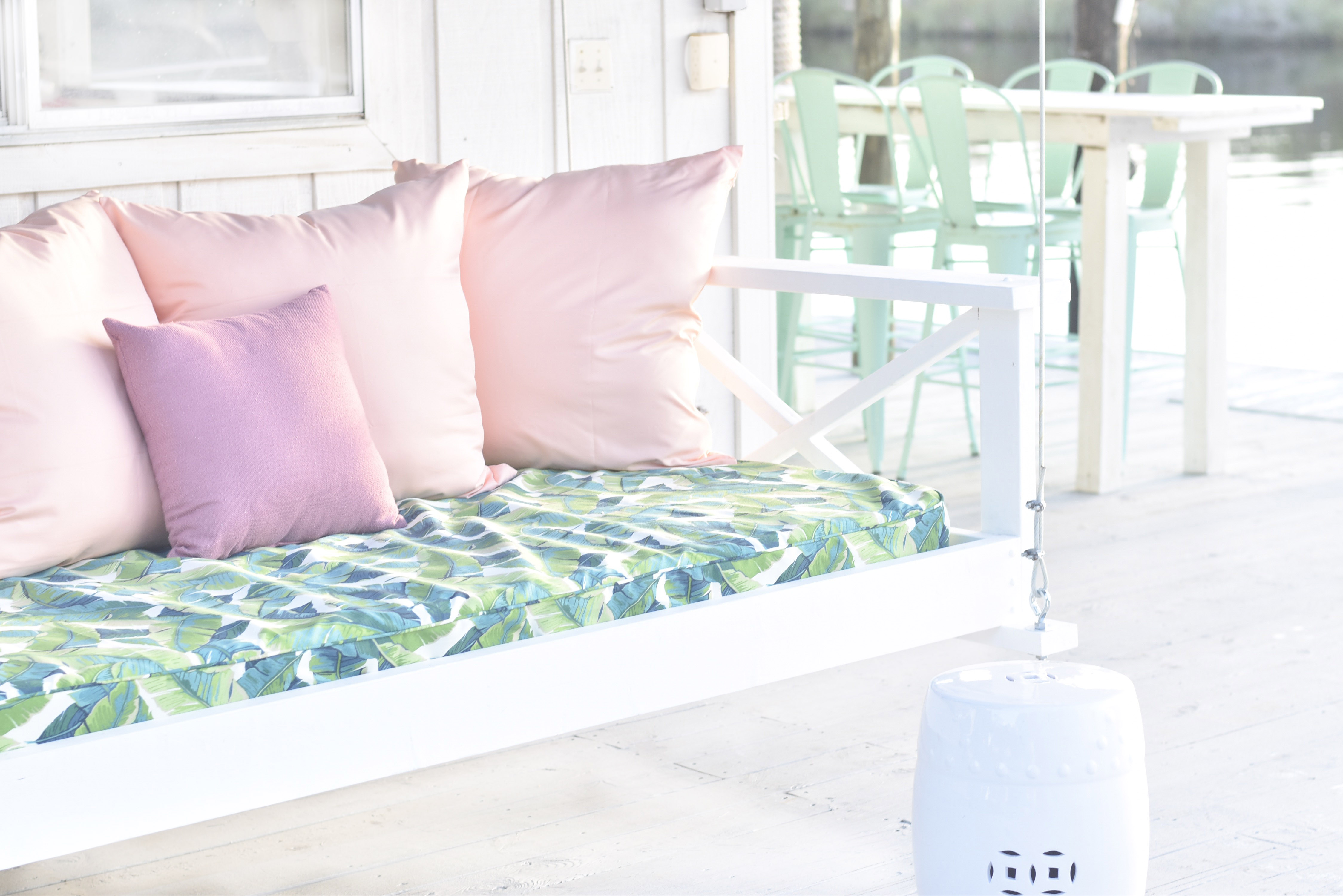 Jami Ray's chic swing bed on the dock by Nate and Lane