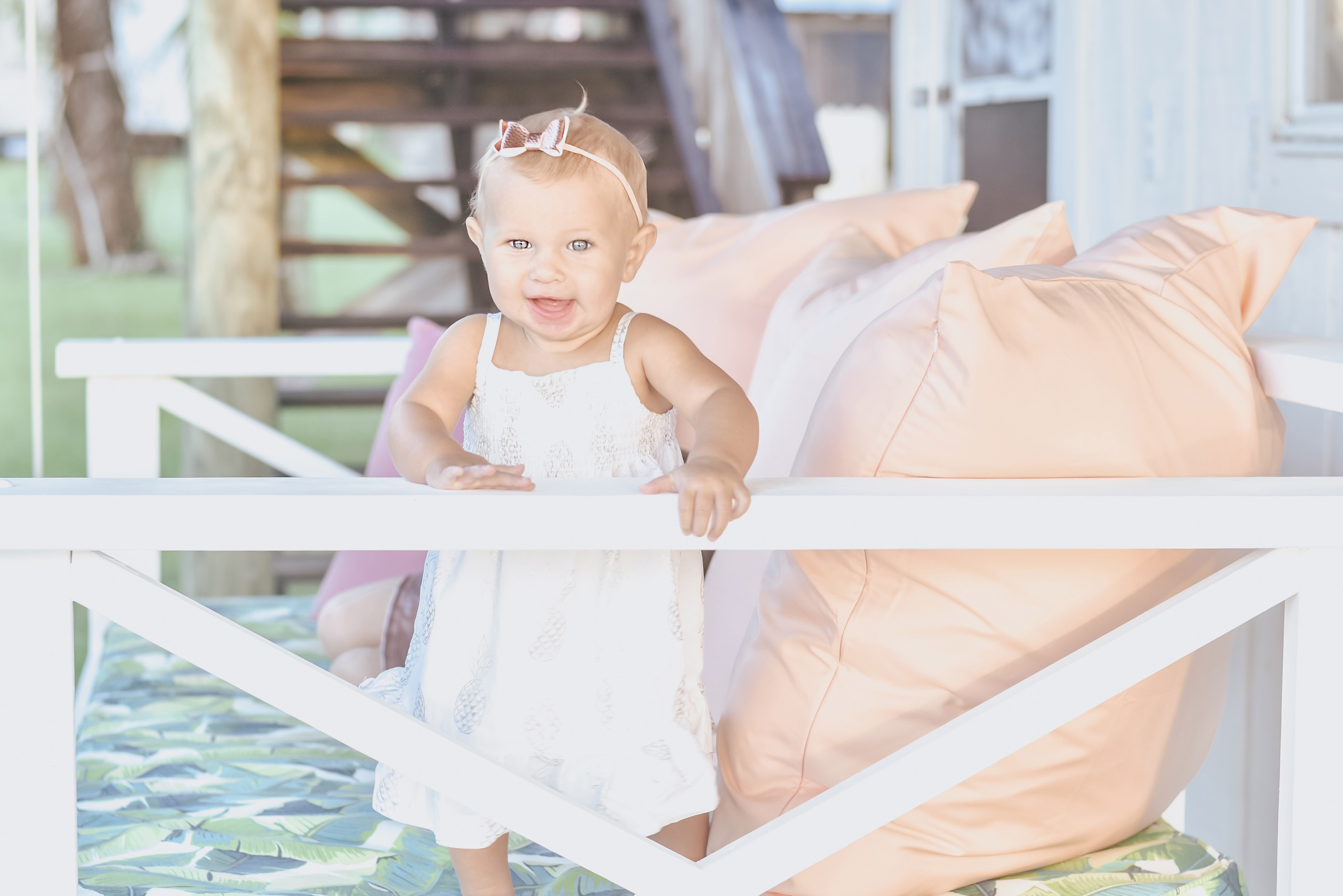 Jami Ray's chic swing bed on the dock by Nate and Lane - little Collins Eliza