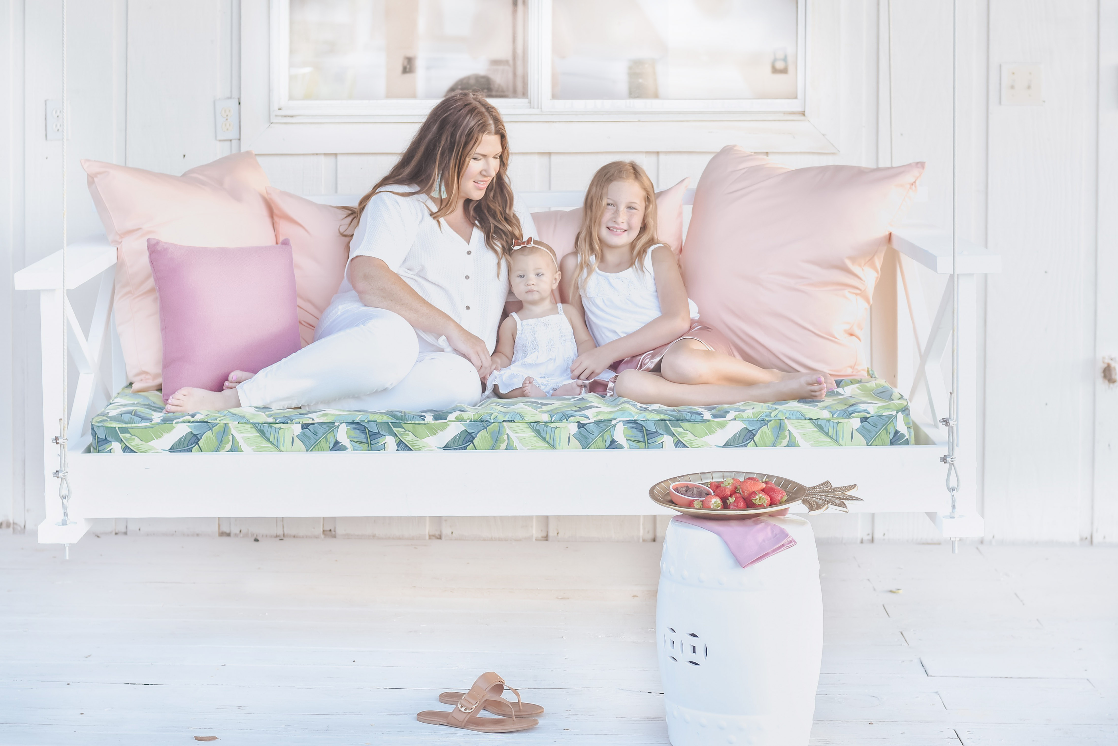 Jami Ray's chic swing bed on the dock by Nate and Lane