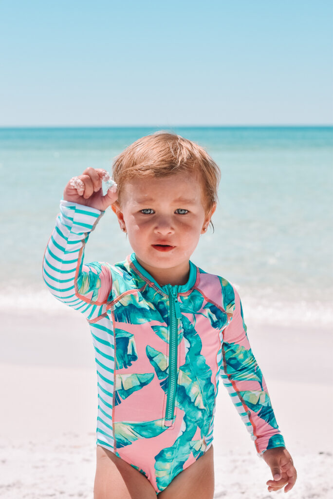 30A Mama wearing Cabana Life swimsuits finding shells