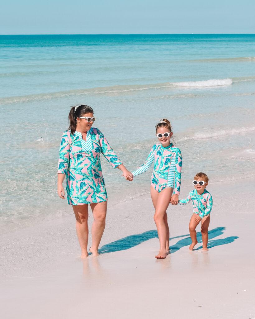 30A Mama wearing Shade Critters swimsuits